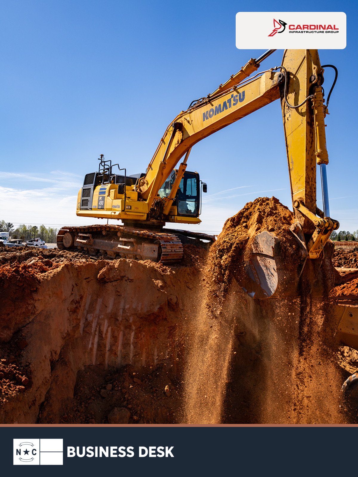 Cardinal Infrastructure Group excavator at a civil construction site with the official company logo and NC Business Desk footer.