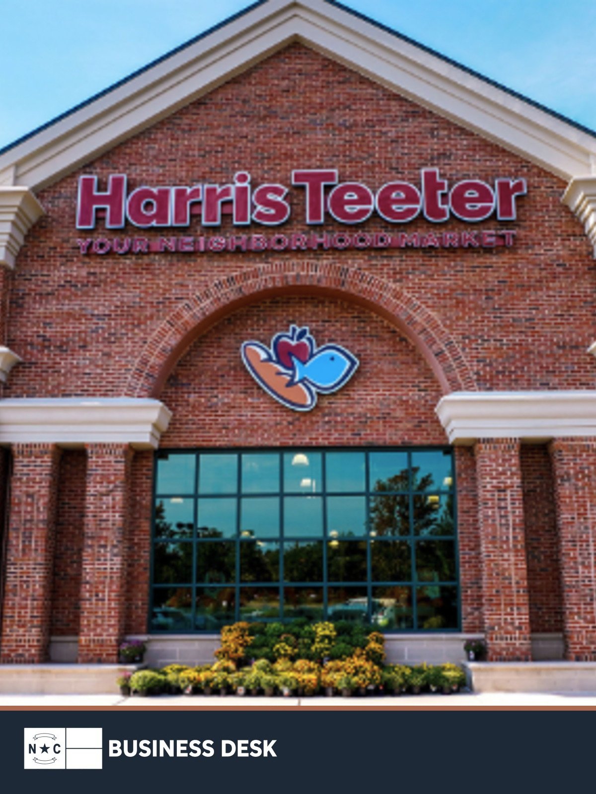 File photograph of a Harris Teeter storefront used to illustrate the company’s Charlotte-region investment, above the NC Business Desk footer.