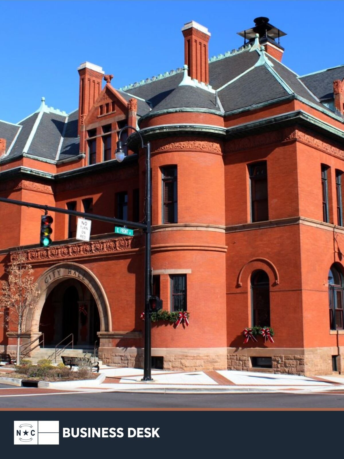 December 2012 file photograph of Statesville City Hall, used to illustrate the City Council's data center moratorium, above the NC Business Desk footer.