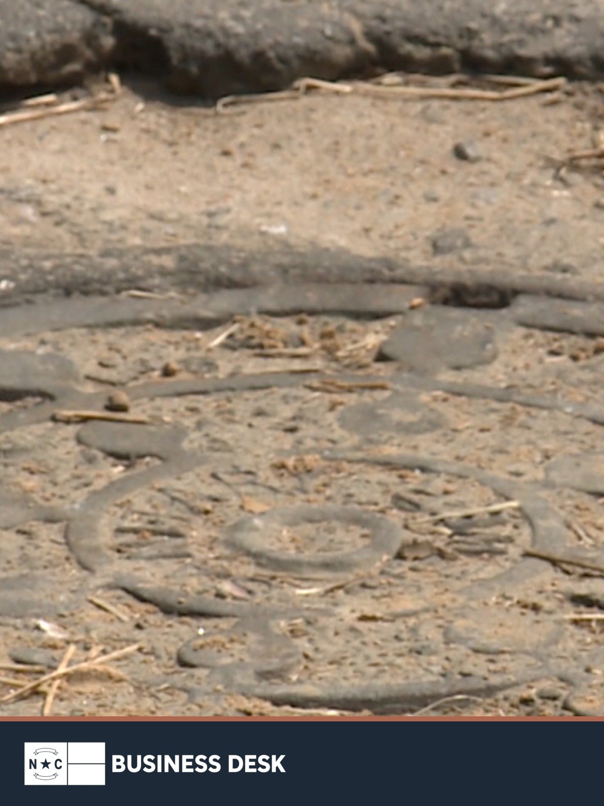 Close-up of a Rocky Mount sewer manhole cover.