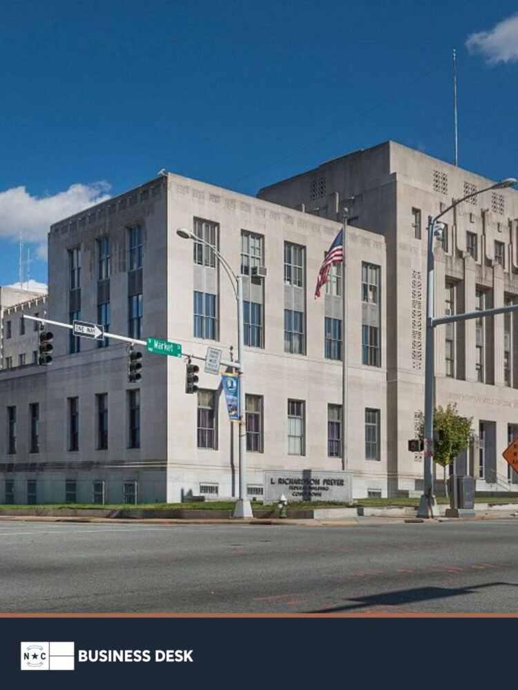 L. Richardson Preyer Federal Building and U.S. courthouse in Greensboro above the NC Business Desk footer.