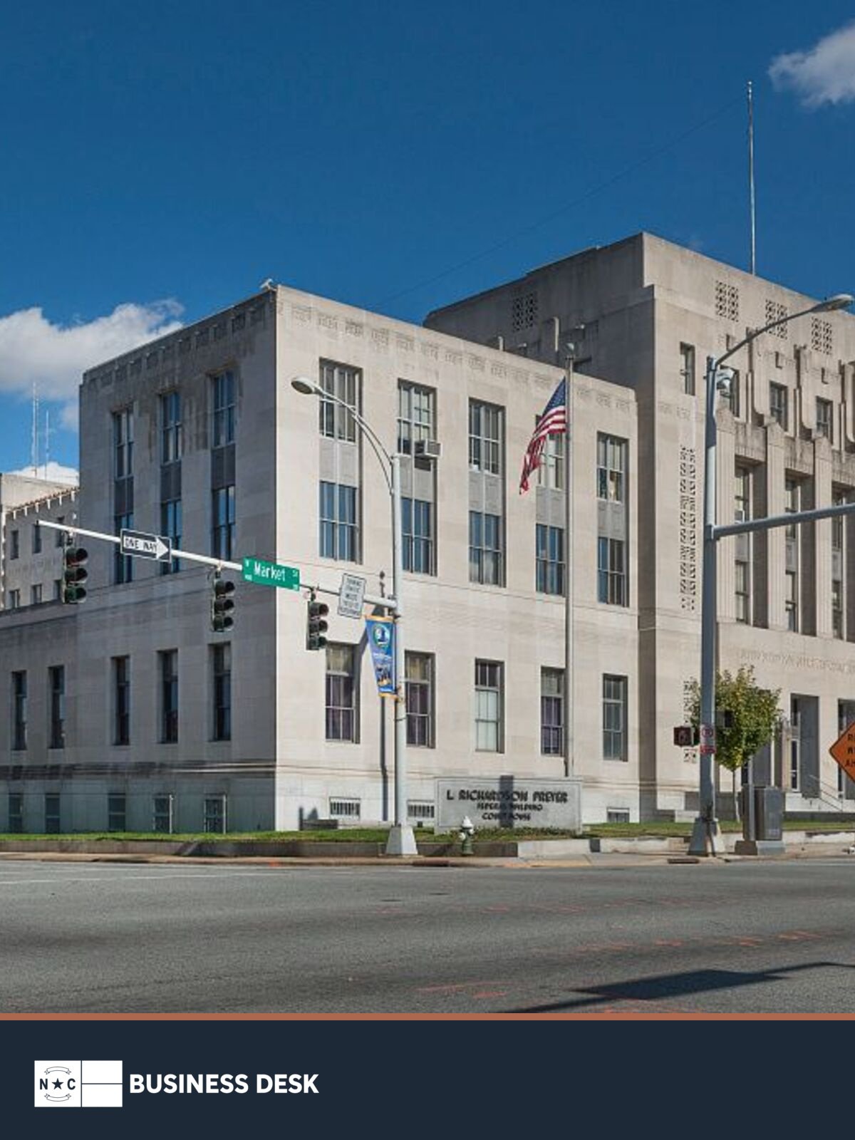 L. Richardson Preyer Federal Building and U.S. courthouse in Greensboro above the NC Business Desk footer.