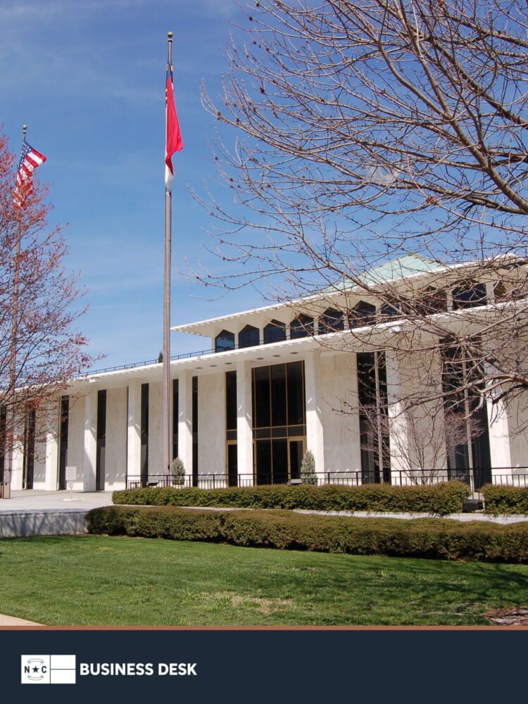 North Carolina Legislative Building in Raleigh above the NC Business Desk footer.