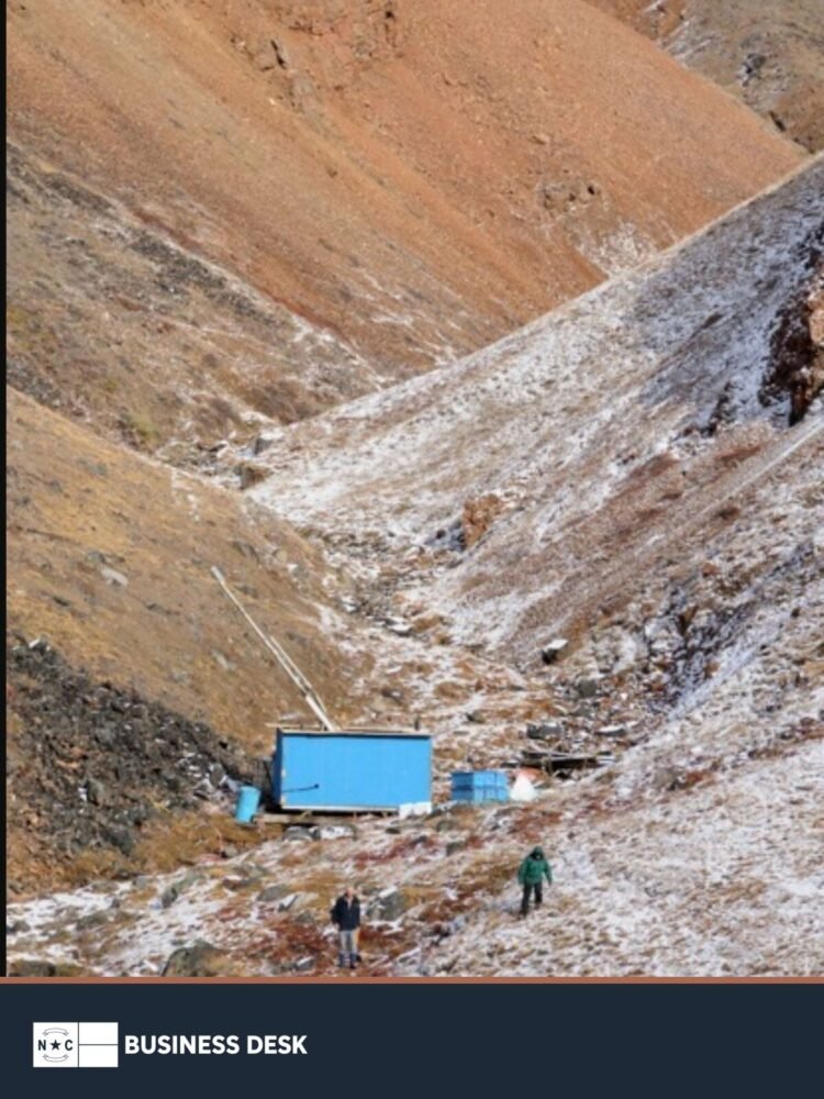 Sarfartoq rare-earth project terrain and field camp in western Greenland above the NC Business Desk footer.