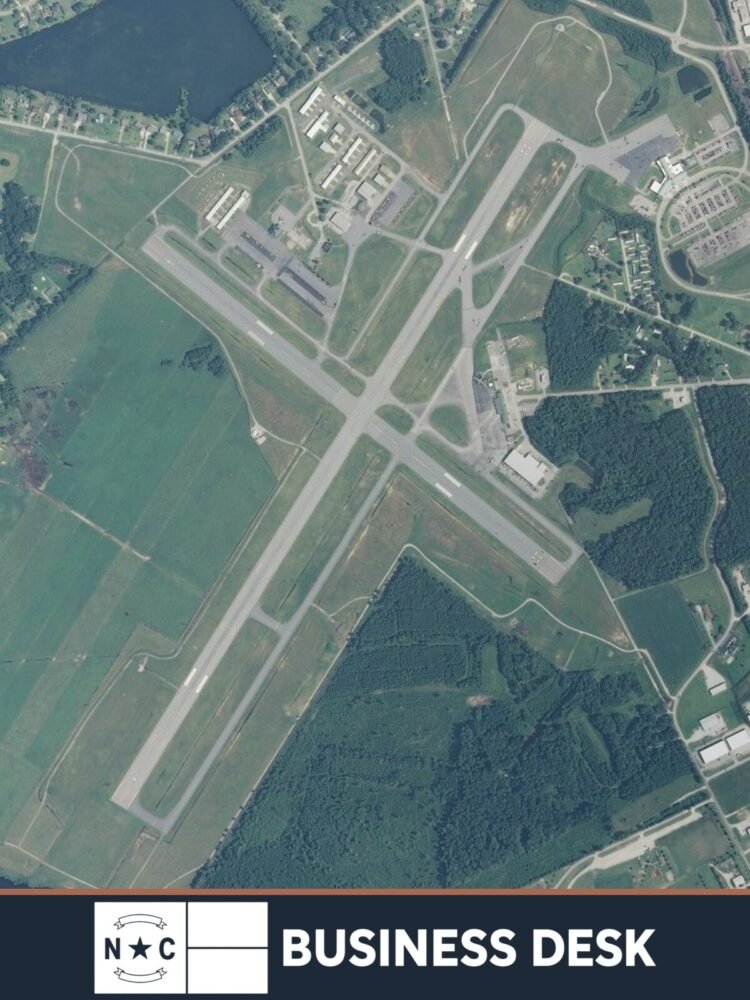 USGS aerial image of Coastal Carolina Regional Airport in New Bern above the NC Business Desk footer.