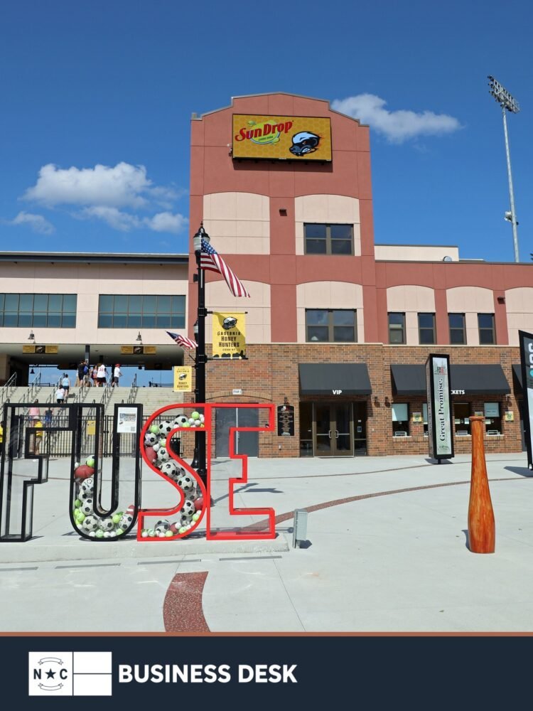 CaroMont Health Park entrance in Gastonia in a 2021 file photograph showing former Honey Hunters signage above the NC Business Desk footer.