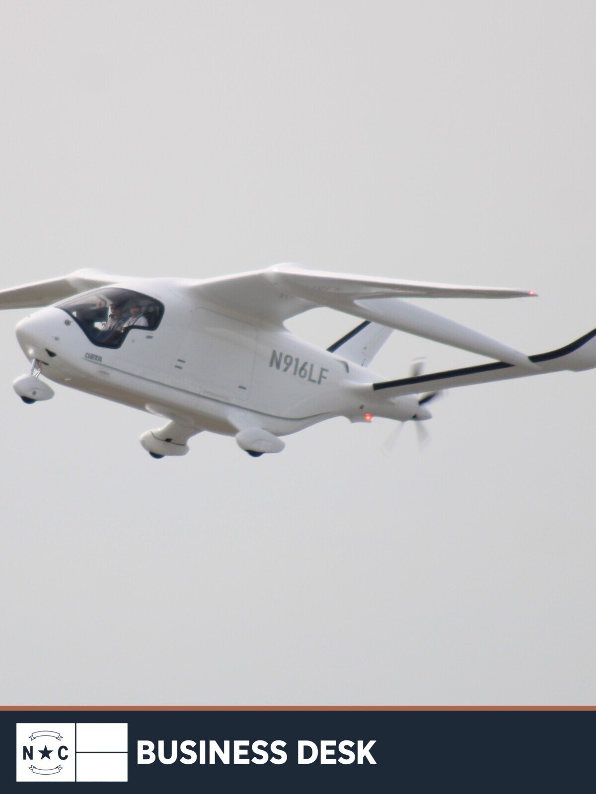 BETA Technologies ALIA CX300 electric aircraft in flight above Daytona Beach International Airport in a 2025 file photograph.