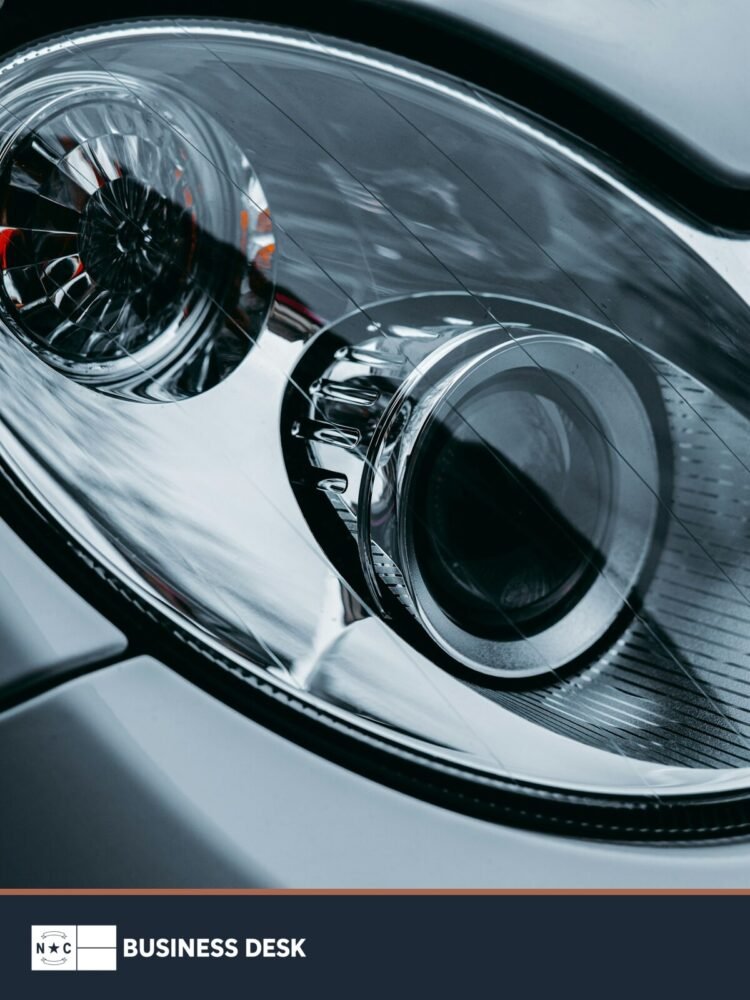 Close-up of a modern automotive headlight assembly, used as contextual imagery for Xingyu's planned Rowan County automotive-lighting plant.
