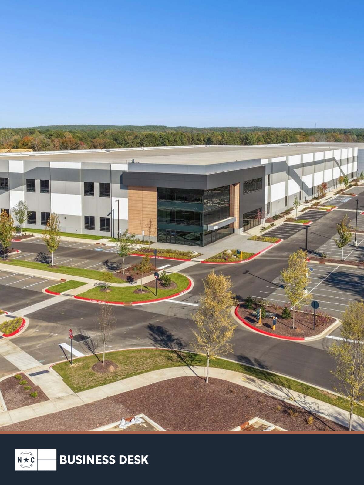 Pathway Triangle’s Phase I advanced-manufacturing building in Morrisville above the NC Business Desk footer.